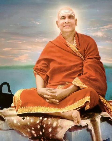 Datei:Swami Sivananda am Ganges.jpg