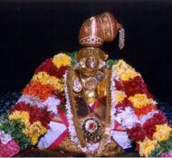 Fotografie einer geschmückten Nammalvar-Murti.